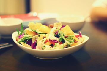 Asian delicious  salad with fresh vegetables, lemon and nuts fro