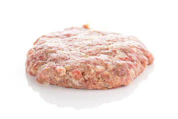 Fresh raw burger cutlets isolated on white background