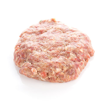 Fresh raw burger cutlets isolated on white background