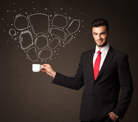 Businessman holding a white cup with speech bubbles