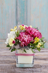 Bouquet of pink carnations and yellow alstroemeria