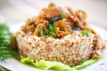 Boiled buckwheat with stewed chicken gizzards