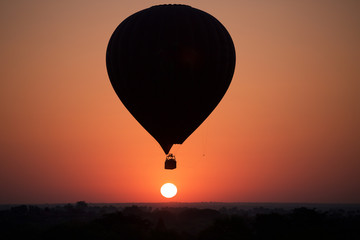Bagan at sunrise with hot air balloon in Myanmar