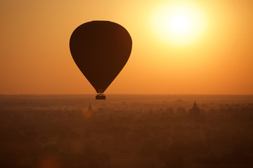 Bagan at sunrise with hot air balloon in Myanmar