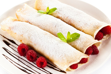 Pancakes with cream and raspberry