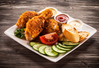 Grilled chicken legs and vegetables