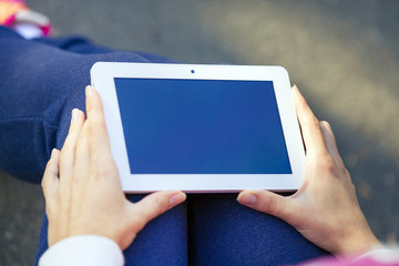 Hand holding White Smartphone