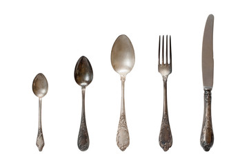 Vintage cutlery on the white background