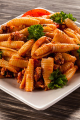 Pasta with meat, tomato sauce and vegetables