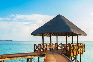 Over water bungalows with steps into amazing green lagoon