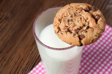glass of milk and tasty cookies