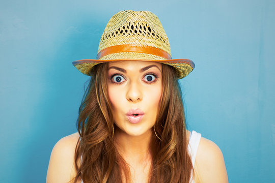 funny woman portrait on blue background.