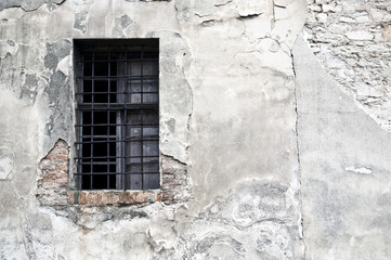 Old window on wall of castle ruins