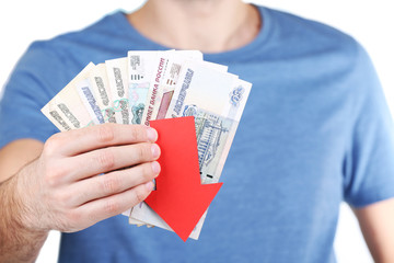 Man holding money and red arrow close up