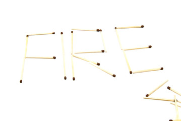 word fire made of matches on white