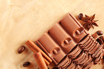 Chopped chocolate on parchment, top view