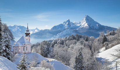 Winter landscape in the Alps with church