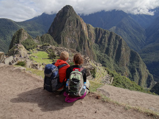 Couple admiring Machu Picchu