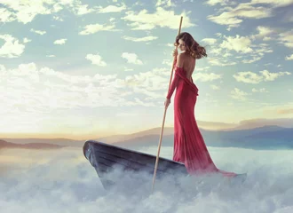 Wall murals Artist KB Alone smart lady paddling in the clouds