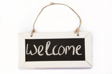 blackboard on rope welcome