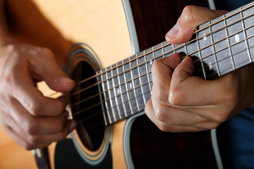 Fototapeta na wymiar Acoustic guitar player performing song