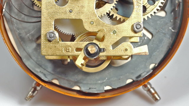 Mechanical clock mechanism in action. Two clips in one.