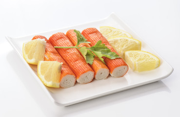 crab sticks with parsley and lemon
