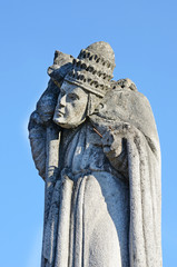 Mystic old stone statue with rolled away head on the headstone i