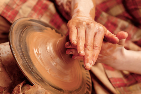 Shaping Cay On Pottery Wheel