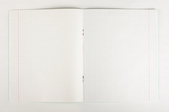 Open blank vintage exercise book isolated