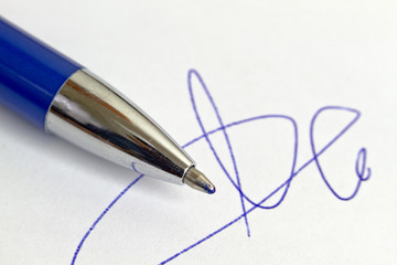 signature and pen