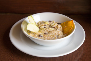 breakfast Oatmeal with apple, raisins, orange