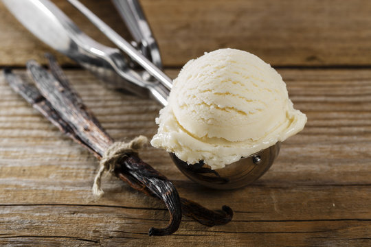 Ball Of Vanilla Ice Cream In A Spoon Scoop