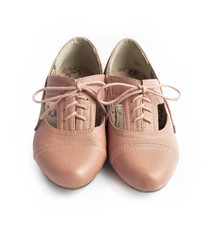 Pair of female shoes on white background