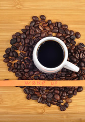 cup of coffee and wake up sign