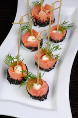 Appetizer of salmon with mozzarella