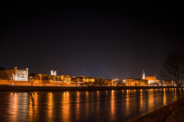 Fototapeta na wymiar View of Magdeburg and the river Elbe at night with stars