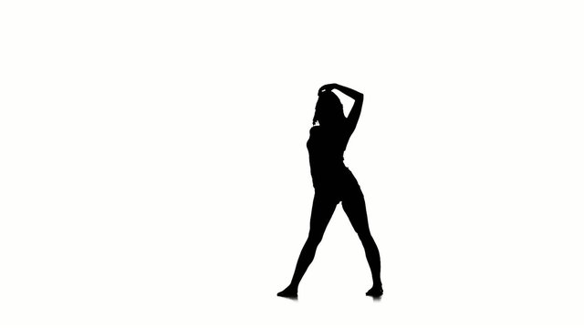 Slim dancer woman dancing on white background, slow motion