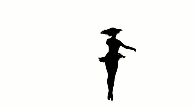 Woman dancing ballet and makes some moves on white background