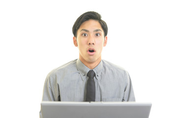 驚いた表情のビジネスマン