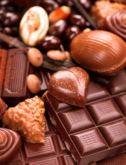 Chocolates background. Praline chocolate sweets