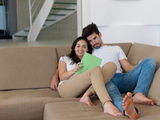 Obraz premium young couple making selfie together at home