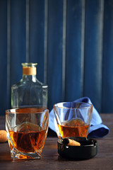 Whiskey on wooden background
