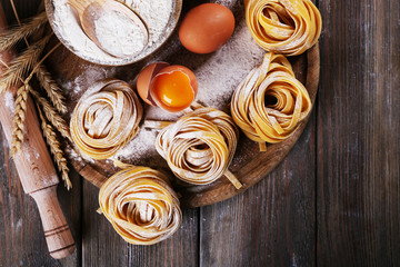 Raw homemade pasta and ingredients for pasta