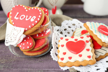 Heart shaped cookies for valentines day, teapot and cups