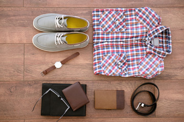 Still life of casual man on wooden background