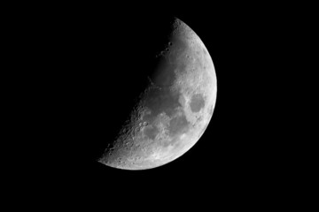 Half earth moon with craters close up