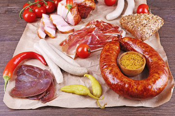 Assortment of deli meats on parchment, closeup