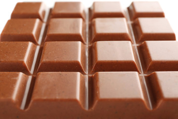 Milk chocolate bar close up