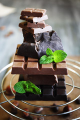 Set of spicy chocolate on metal stand, closeup